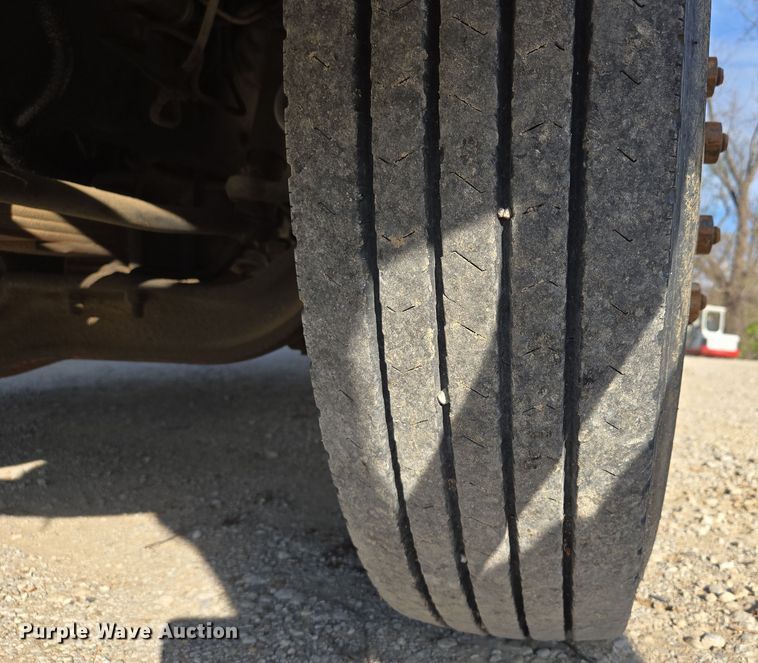 image for item EM7108 1995 International  4700 DT466 dump flatbed truck