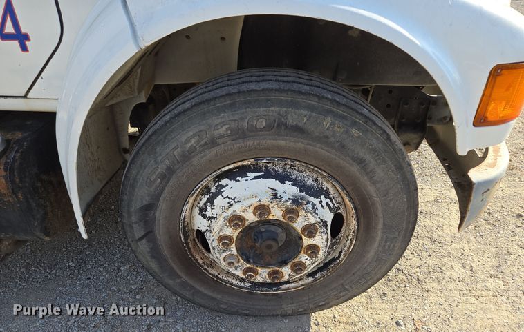 image for item EM7108 1995 International  4700 DT466 dump flatbed truck