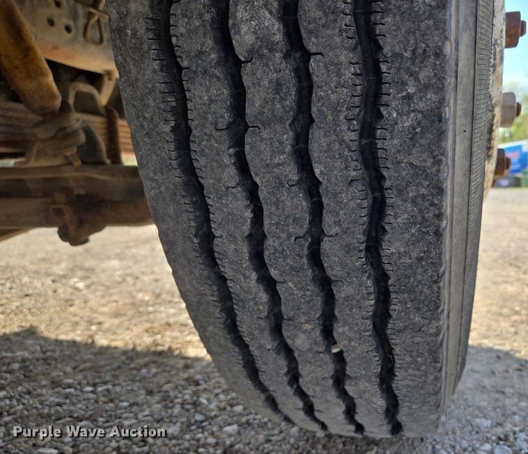 image for item EM7108 1995 International  4700 DT466 dump flatbed truck