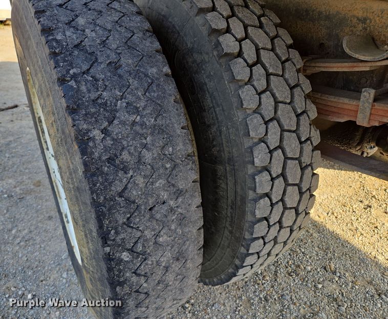 image for item EM7108 1995 International  4700 DT466 dump flatbed truck