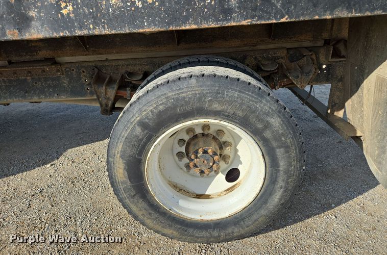 image for item EM7108 1995 International  4700 DT466 dump flatbed truck