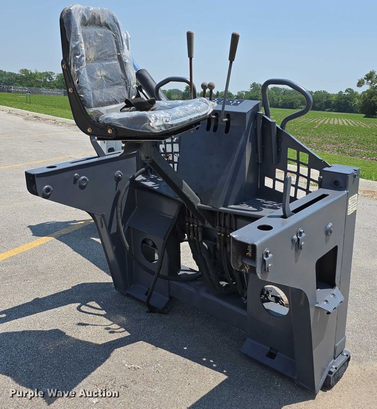 image for item EO1040 Bobcat 709 skid steer backhoe