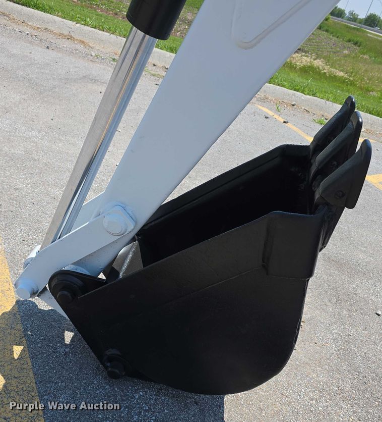 image for item EO1040 Bobcat 709 skid steer backhoe