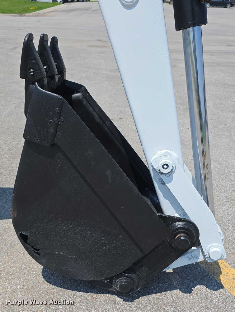 image for item EO1040 Bobcat 709 skid steer backhoe