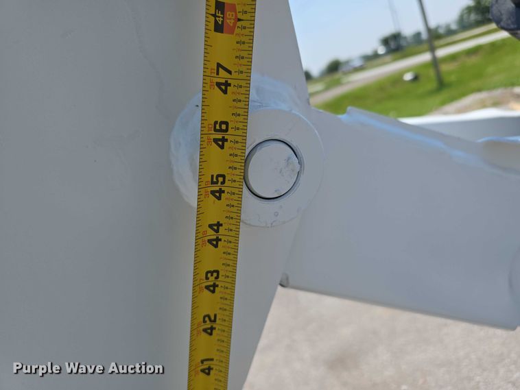 image for item EO1040 Bobcat 709 skid steer backhoe