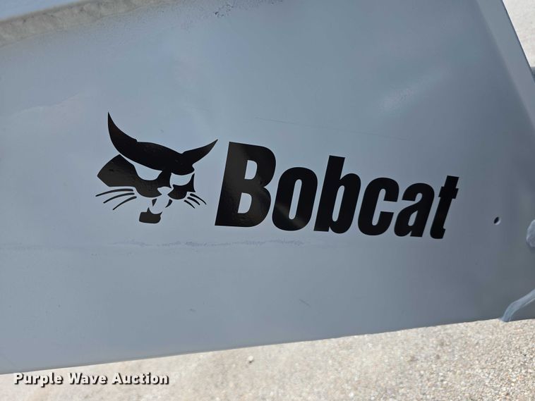 image for item EO1040 Bobcat 709 skid steer backhoe