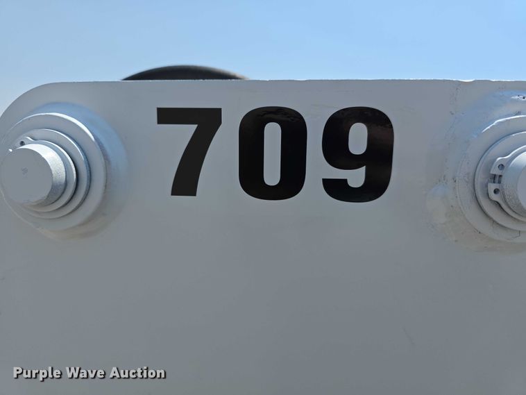 image for item EO1040 Bobcat 709 skid steer backhoe