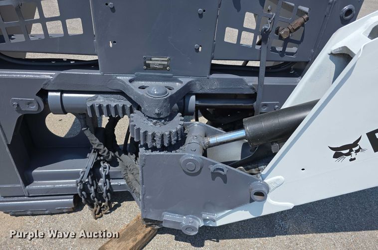 image for item EO1040 Bobcat 709 skid steer backhoe
