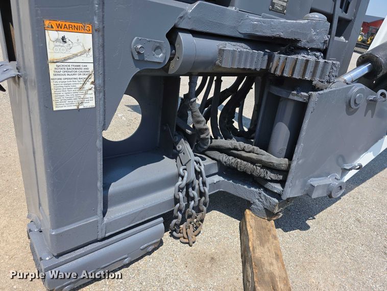 image for item EO1040 Bobcat 709 skid steer backhoe