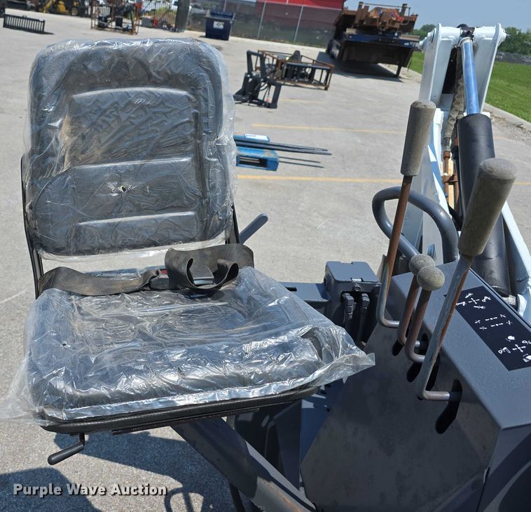 image for item EO1040 Bobcat 709 skid steer backhoe