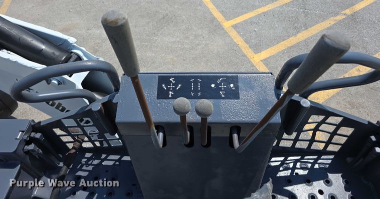 image for item EO1040 Bobcat 709 skid steer backhoe