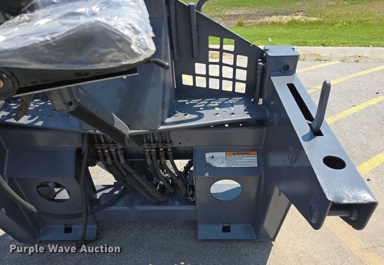 image for item EO1040 Bobcat 709 skid steer backhoe