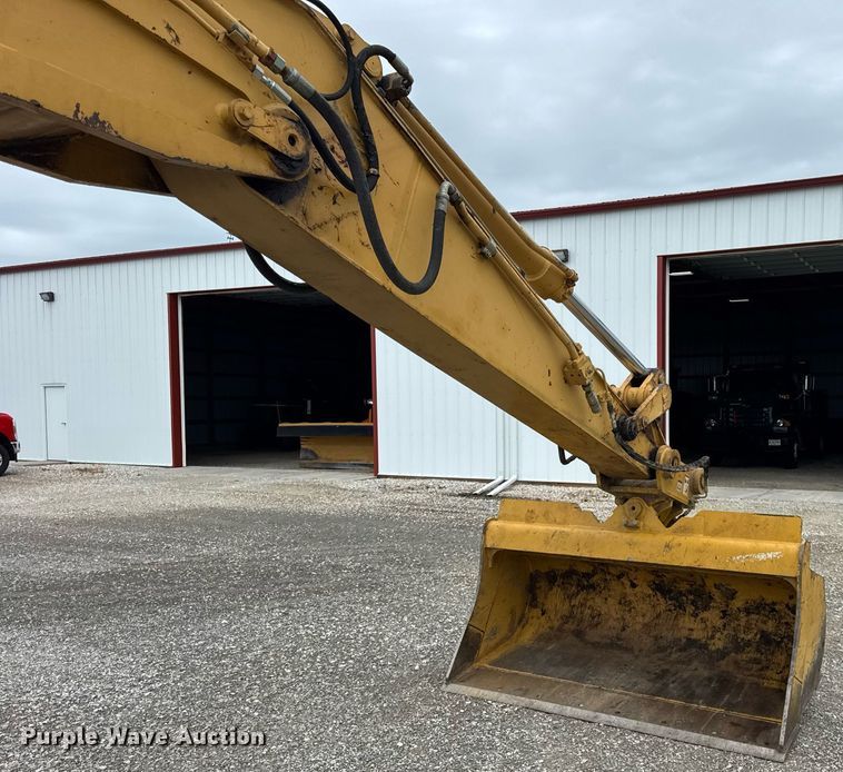 image for item DI9055 2005 Caterpillar M318C wheeled excavator