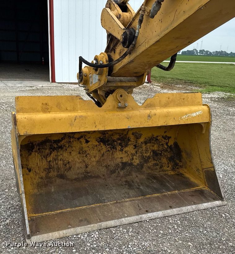 image for item DI9055 2005 Caterpillar M318C wheeled excavator