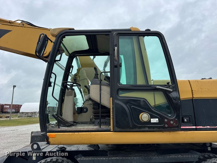 image for item DI9055 2005 Caterpillar M318C wheeled excavator