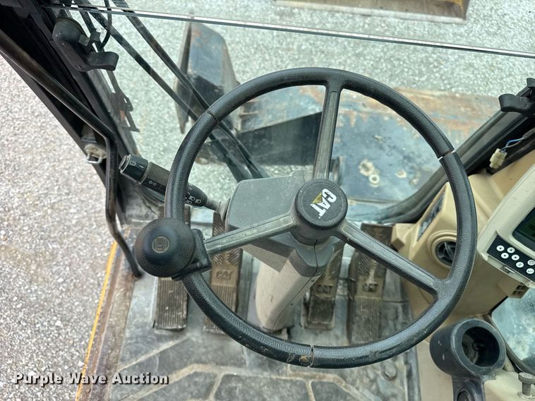 image for item DI9055 2005 Caterpillar M318C wheeled excavator