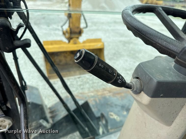 image for item DI9055 2005 Caterpillar M318C wheeled excavator