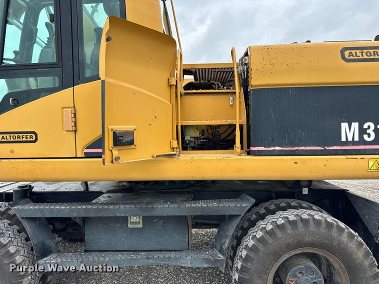 image for item DI9055 2005 Caterpillar M318C wheeled excavator