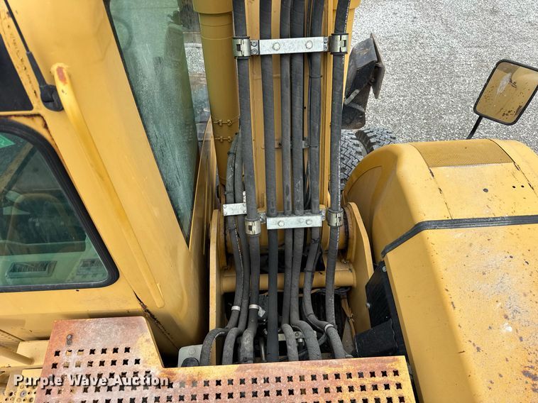 image for item DI9055 2005 Caterpillar M318C wheeled excavator