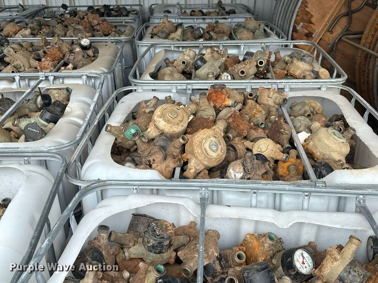 image for item EG8530 (21) poly totes of water meters 