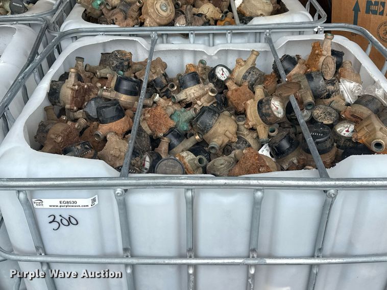 image for item EG8530 (21) poly totes of water meters 