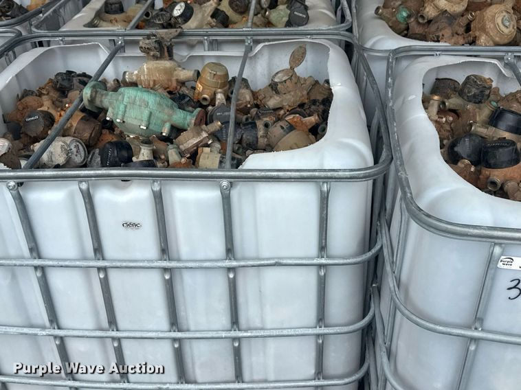 image for item EG8530 (21) poly totes of water meters 