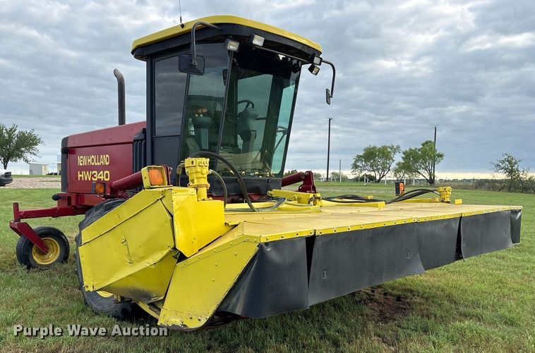 image for item DY0539 1999 New Holland HW340 swather / windrower