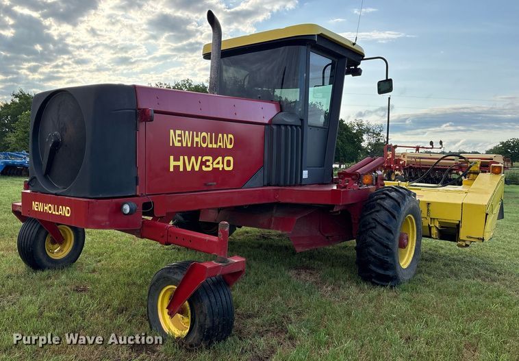 image for item DY0539 1999 New Holland HW340 swather / windrower