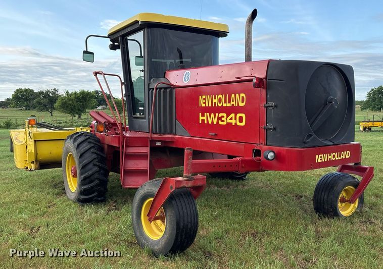 image for item DY0539 1999 New Holland HW340 swather / windrower