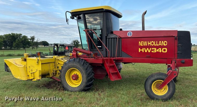 image for item DY0539 1999 New Holland HW340 swather / windrower