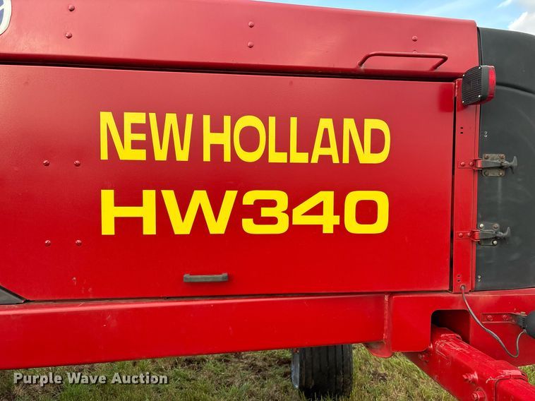 image for item DY0539 1999 New Holland HW340 swather / windrower