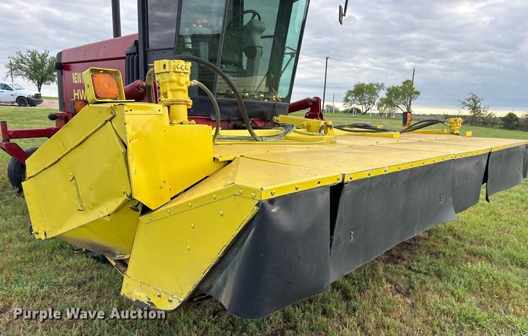 image for item DY0539 1999 New Holland HW340 swather / windrower