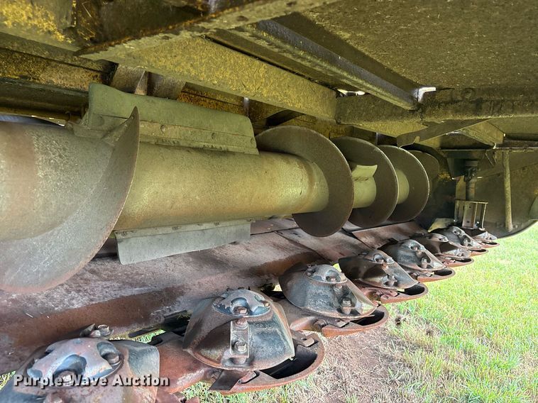 image for item DY0539 1999 New Holland HW340 swather / windrower