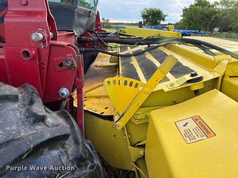 image for item DY0539 1999 New Holland HW340 swather / windrower