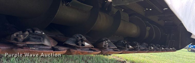 image for item DY0539 1999 New Holland HW340 swather / windrower