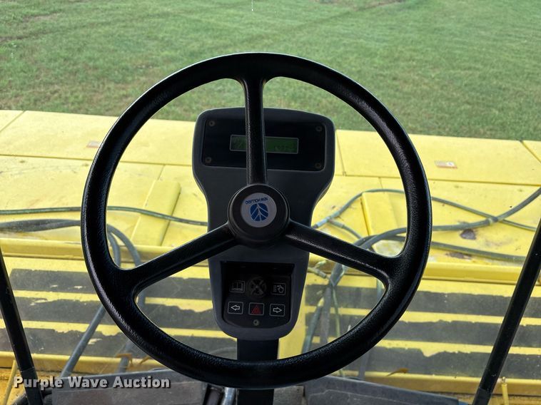 image for item DY0539 1999 New Holland HW340 swather / windrower