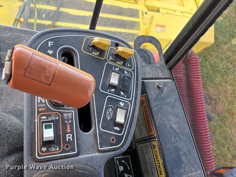 image for item DY0539 1999 New Holland HW340 swather / windrower