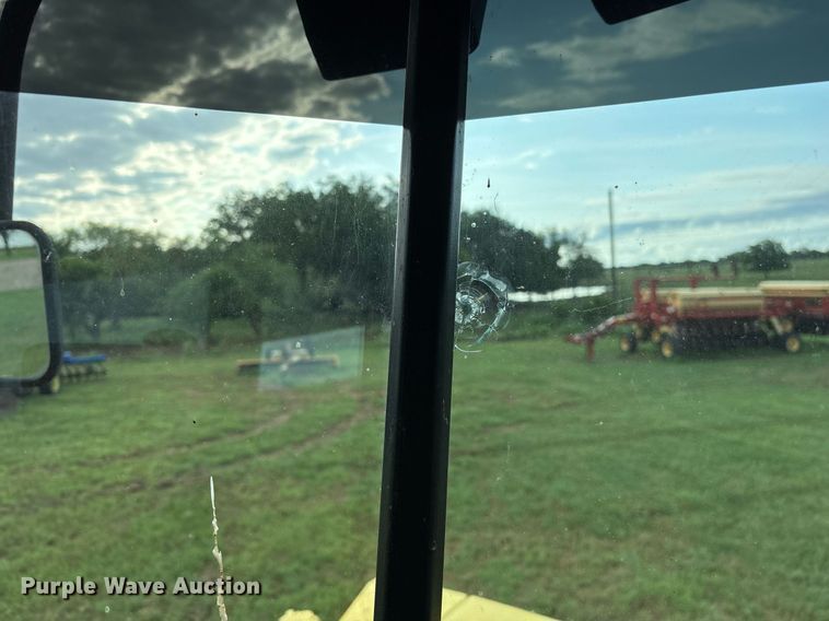 image for item DY0539 1999 New Holland HW340 swather / windrower