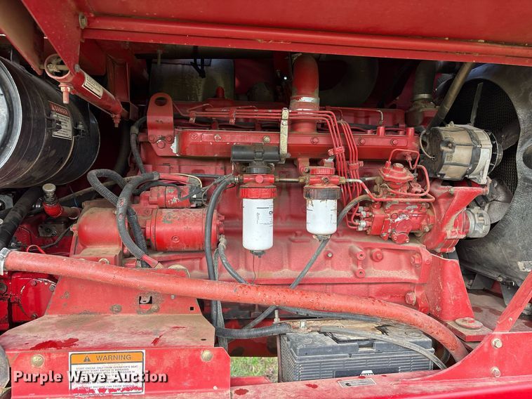 image for item DY0539 1999 New Holland HW340 swather / windrower