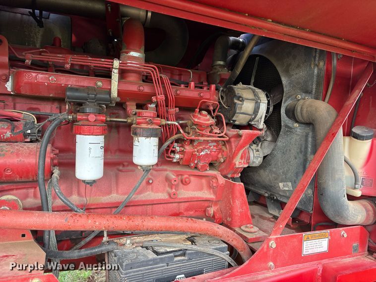 image for item DY0539 1999 New Holland HW340 swather / windrower