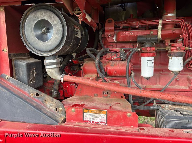 image for item DY0539 1999 New Holland HW340 swather / windrower