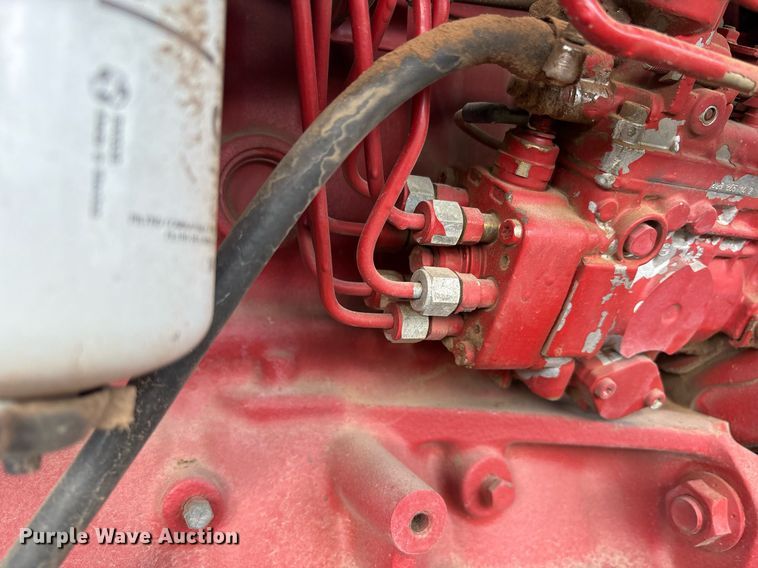 image for item DY0539 1999 New Holland HW340 swather / windrower