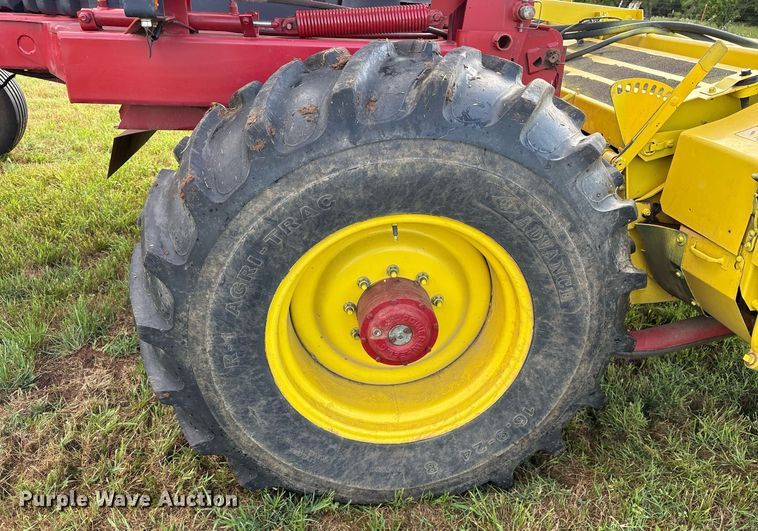 image for item DY0539 1999 New Holland HW340 swather / windrower