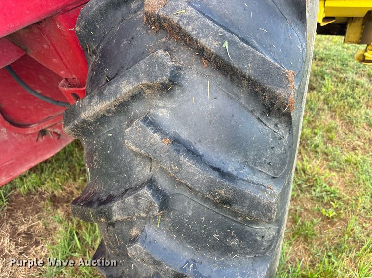 image for item DY0539 1999 New Holland HW340 swather / windrower