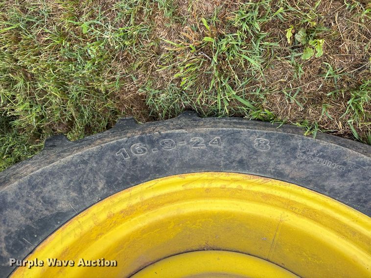 image for item DY0539 1999 New Holland HW340 swather / windrower