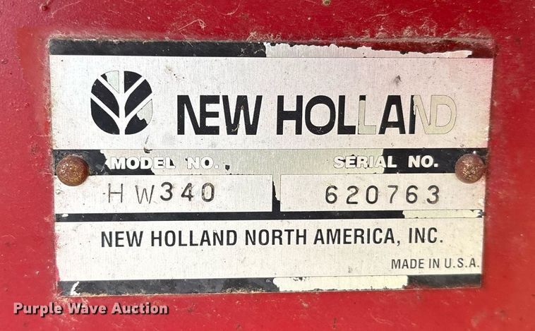 image for item DY0539 1999 New Holland HW340 swather / windrower