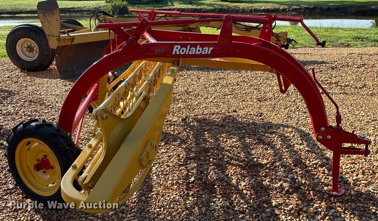 image for item DY0598 New Holland Rolabar 256 hay rake