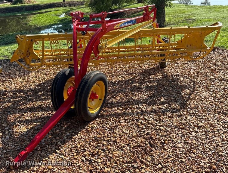 image for item DY0600 New Holland Rolabar 258 hay rake