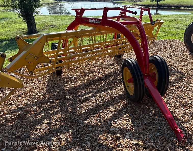 image for item DY0600 New Holland Rolabar 258 hay rake