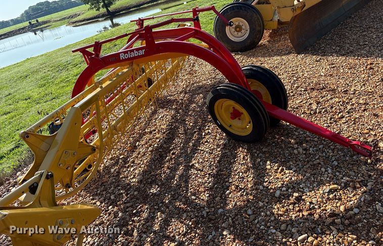image for item DY0600 New Holland Rolabar 258 hay rake